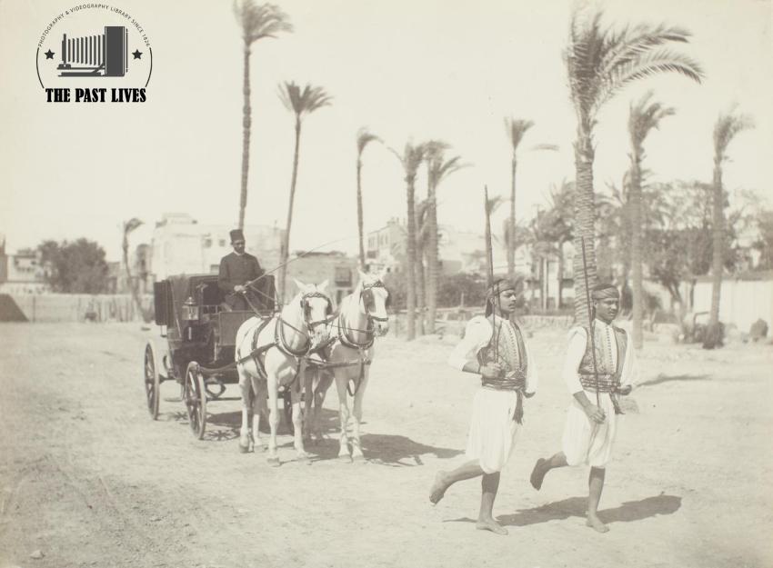 Egypt, Cairo. A cavalryman running in front of a carriage, 1875